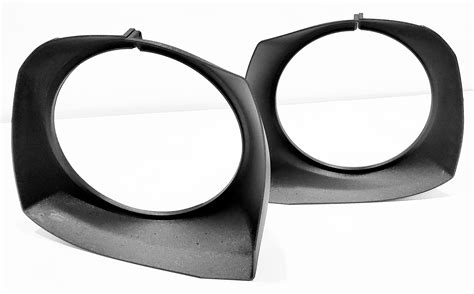 Lased designs. These bezels will fill in the empty space around the 7" Headlights when using our 7" Headlight Adapters. These are not required when doing the conversion but do give your Hummer an OEM appearance after converting your headlights. Made of durable Carbon Fiber reinforced Nylon. Includes Left and Right bezels and hardwar. 