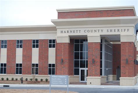 The Harnett County Detention Center is an inmate detention facility with its main location at 175 Bain Street. PO Box 399, Lillington, NC, 27546. The Harnett County Detention Center works to detain inmates, usually for short-term incarceration sentences. However, the Harnett County Detention Center also sometimes houses serious …. 