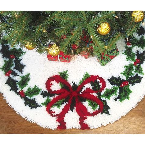 Latch hook tree skirt. You save $10.00. This latch hook tree skirt design features a snowy silhouette showing white dear standing in front of shadowed evergreen trees on a winter night. Kit includes 3.75-mesh gridded canvas, lofty pre-cut 100% acrylic yarn, clear vinyl storage bag, easy-to-follow chart, and instructions. Latch hook tool, rug binding, and non-slip ... 