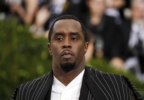 Lawsuit accuses Sean Combs, 2 others of raping 17-year-old girl in 2003; Combs denies allegations