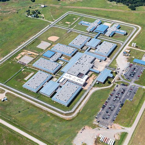 Lawton correctional facility. The private prison company The GEO Group Inc. will close its 1,940-bed Great Plains Correctional Facility in Hinton at the end of May. ... The company also operates a 2,682-bed prison in Lawton ... 
