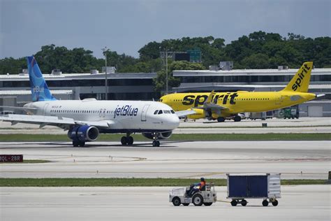 Lawyers suing JetBlue say the airline could raise fares on some routes after buying Spirit Airlines