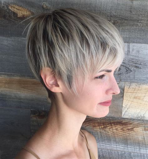 Short stylish haircut for 50 year old woman with glasses. Medium length with side part IG@thesilverstylist. Shoulder length with layers. Graduated bob with highlights. Long pixie haircut for thin hair. Long pixie haircut with a deep side part. Short bob with a subtle bangs. Stylish pixie cut for older women over 50.. 