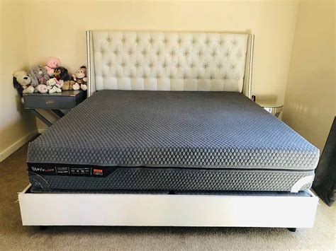 Layla hybrid mattress. The Layla Hybrid mattress is 13 inches tall and has seven total layers, including its top and bottom covers. Both covers are soft and outfitted with handles to make flipping the bed easy. Underneath each one is a layer of copper-gel memory foam: a thicker, plusher layer on the softer side, and a thinner, firmer … 