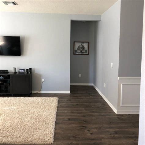 Sherwin Williams Lazy Gray is a perfect mid to lighter-toned paint that has a delightful mixture of blue and gray both – it’s a great all-in-one solution. It has deep cool undertones to make your room look enlarged and light – and also soothing and cool at the same time.. 