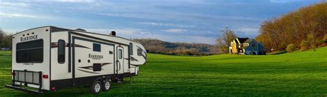 Leach Camper Sales, Inc. Provides Camping Equipment & Supplies, Motorhomes, Travel Trailer, Fifth Wheel, Tent Trailers And Toy Hauler To The Council Bluffs, IA Area. Photos LOGO. 