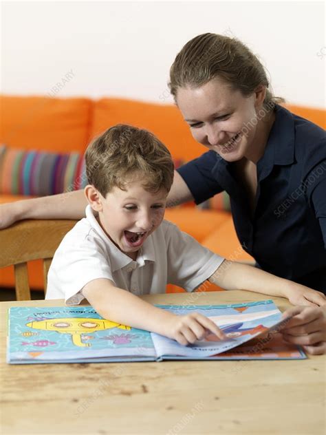 Learning to read Stock Image F003/3559 Science Photo Library