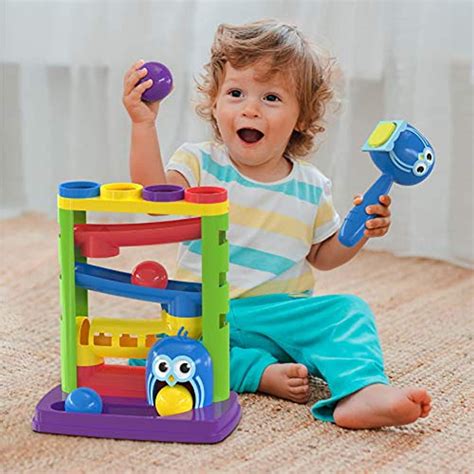 Learning toys for 1 year olds. Wooden Musical Instruments. Simple wooden musical instruments are great for introducing music, sounds, and noise while having different sensorial experiences. Music stimulates a child’s brain and can make learning easy. It is calming and improves two-year-olds creativity and imagination. It facilitates brain development. 