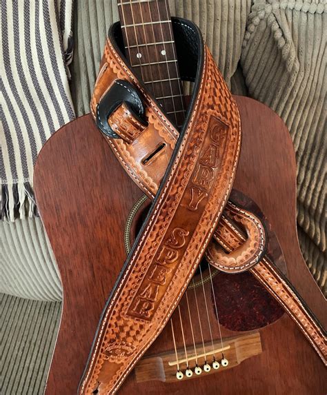 Leather guitar strap.  Our devoted staff is committed to producing genui...