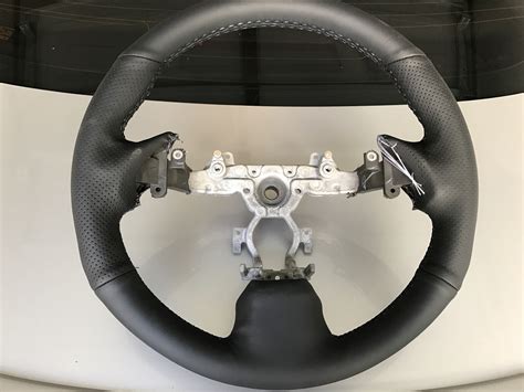 Our Process. Your steering wheel is the most touched part of your vehicle. So why would you want to hold a worn, torn or ruff wheel while you are driving? We are often able to refinish and dye steering wheels to like new condition. Call today! (910) 793-5511. 1.