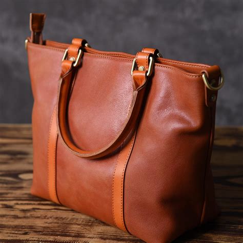 Leather work bag. Personalized Top Grain Leather Travel 16” Laptop Bag - Briefcase Satchel Portfolio Notebook Tablet Messenger Bag for Men & Women. (27.4k) $109.99. $219.98 (50% off) Sale ends in 17 hours. FREE shipping. 