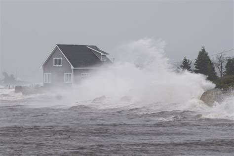 Lee brings flooded roads, downed trees and power outages as it heads toward Maritimes