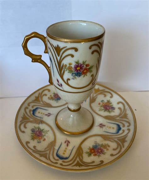 Lefton china hand painted tea cup and saucer. Up for auction is a vintage cup and saucer set from LEFTON China Marked: spring, Hand Painted, WK 780The saucer measures 5.75" across, the teacup is about 2.25" high, and 4" across.Fantastic condition with no chips, cracks or damage of any kind.I have the autumn Cup and saucer up for auction also.Buyer pays shipping only ... no hidden fees. 