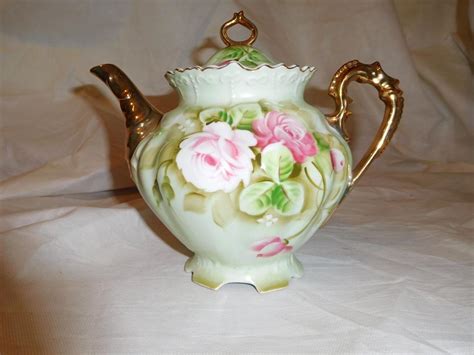 Lefton China Hand Painted Heirloom Rose KF1075R: Mini Coffee Pot, Sugar Bowl and Creamer (58) $ 125.00. FREE shipping Add to Favorites Lefton China Rose Chintz Lidded Coffee Tea Pot, Pink and Red Roses with Gold Trim (85) Sale Price $59.50 $ 59.50 $ 70.00 Original Price $70.00 (15% off) Add to Favorites Vintage Lefton Teapot & creamer - …. 
