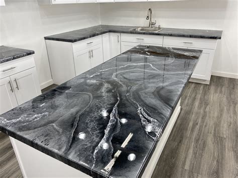 Epoxy Counters are easy to install and will give you a custom one-of-a-kind finish. These Epoxy Countertop Kits are designed to go right over your existing countertops. This kit covers up to 50 sq ft. and includes Primer, Epoxy, and Metallics with an optional Top Coat. Not sure how many kits you need? 