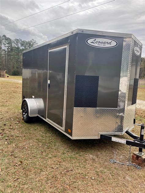 Leonard trailers charleston sc. This 7-foot x 18-foot flatbed utility trailer is a great deal. This versatile workhorse has a 7000-pound Gross Vehicle Weight Rating, steel deck, steel slide-in ramps, 15-inch tires, 2 5/16-inch coupler with top wind jack, 1 brake, and LED lighting that meets all D.O.T. requirements. Haul payloads of up to 5,250 pounds on this trailer that is ... 