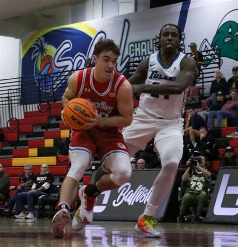 Leons scores 18 to lead Bradley over Tulane 80-77 at SoCal Challenge