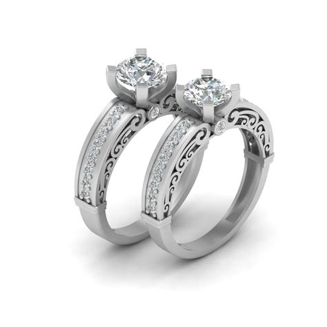 Lesbian wedding rings. Sky’s The Limit: Beautiful Natural Pink Diamond Double Halo Engagement Ring For $3860.00. Photo: Carolyn and Nicole Designs. Sky’s The Limit: White Sapphire Skull and Pentagram Wedding Rings Set For $2,686.00. 10. Woolton & Hewitt. This UK based company bills itself as a specialist in fine quality lesbian wedding rings. 