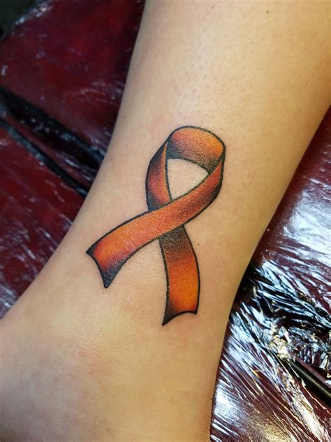 Leukemia tattoo designs. Phil walked into the lobby of the tattoo shop wearing a beanie hat paired with a tank top showing little peeks into his own rich tattoo history. I searched different... Edit Your P... 