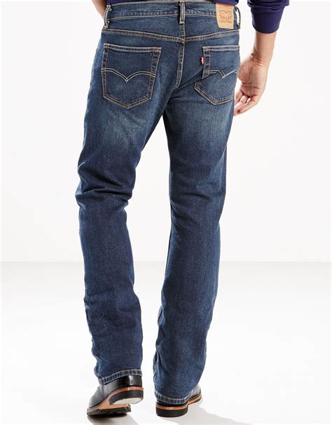 A modern take on bootcut jeans, the 527™ Slim Bootcut has a slim fit through the thigh and a slightly slimmer bootcut leg opening. This pair has just the right amount of stretch for all-day comfort. Style # 055270545. Color: Medium Wash. How it Fits. Sits below waist. Slim through thigh. Bootcut Leg. . Levi 527 jeans