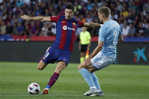 Lewandowski, Cancelo lead Barcelona to 3-2 comeback win over Celta with 3 goals in final 10 minutes