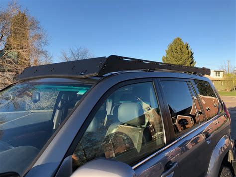 The GX470 Roof Rack from Southern Style OffRoad is a cutting-edge design that provides the durability and versatility needed when hitting the trails. The low-profile matte black design adds just over 2 inches of overall height to your Lexus GX470 while maintaining a clean factory appearance.