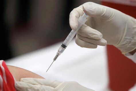 Liberals lag on invitation to join global group that crafts vaccines for world’s poor
