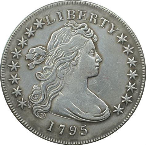 This variety has the liberty portrait shifted towards the left side of the design and off-center. This can also be identified by noticing how the bust is closer to the stars on the left side. The difference between the 1795 Centered vs Off-Centered Bust is depicted below in the example comparison image: . 
