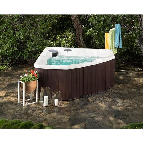 Lifesmart hot tub. For a smaller group, the Lifesmart Spas plug-and-play hot tub is the perfect fit. At 6 feet long and shaped like a wedge, it offers ample room for two while still taking up little space in a corner. At 6 feet long and shaped like a wedge, it offers ample room for two while still taking up little space in a corner. 