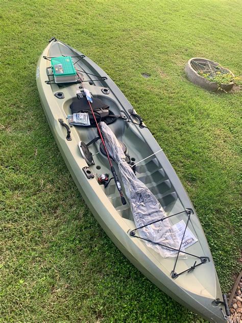 Lifetime 10 ft. tioga angler fishing kayak. The Kenai 10 ft. 3 in. sit on top kayak comes with front and rear carry handles, side carry handles, one storage hatch, tankwell storage accomodates for milk crate or bait bucket, and two flush mounted rod holders, and includes paddle 1169412. Intended Water Type: Flat: Kayak Length: 10 ft: Kayak Type: Sit on Top: Kayak Weight Capacity: 500 lb 