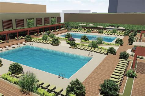 Lifetime greenway. Life Time purchased the Greenway Plaza space in 2017 and began work in 2018 to create the ultimate athletic resort experience for members. The entire 150,000-square foot club was reimagined including the addition of a rooftop pool deck—a first in the market—covering 54,000-square feet on top of the existing parking structure. 