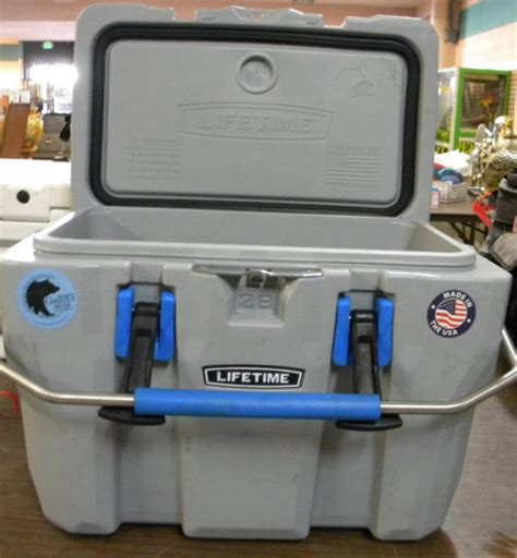 Lifetime ice chest parts. Lifetime 77 quart blow molded cooler features (2) rope handles with blue injection molded grips, (4) feet that are serviceable, drain spout with hose hook up, bottle opener, holes for a lock (lock not included), (2) cam latches that secure lid when shut and up to 9-day ice retention. Comes with a 5-year limited warranty. 