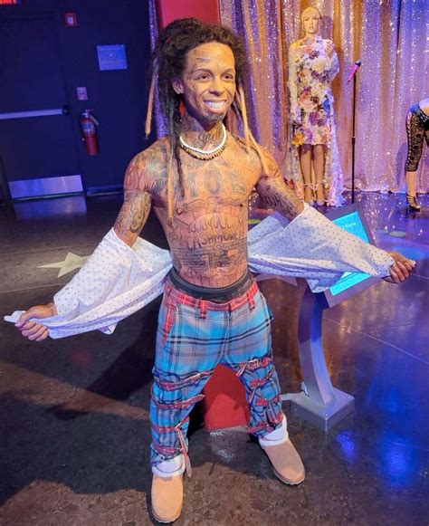 Lil Wayne isn't happy about his wax statue