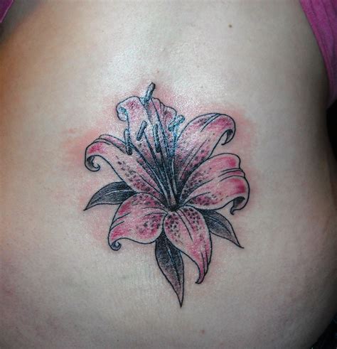A lily tattoo can have a variety of meanings. Instagram. Where rose tattoos symbolize passion, elegance, and love, lily tattoos represent partnerships and femininity. Moreover, the Ancient Greeks believed that the first lily flowers were born from Hera's milk. Because of this, they also represent mothers and motherhood (via Pacho Tattoo ).. 