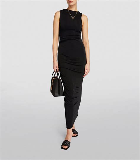 Line by k. TRENDING SEARCHES. @thelinebyk. ESSENTIALS. BACKLESS DRESS. BEST SELLERS. KYO. Accessibility Assistance. The Josephine tank top in deep v-neck showcases sensuality with comfortable rounded cups, thick straps, and a flattering fit. 