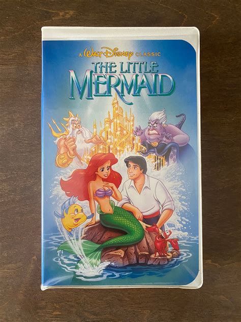 Little mermaid vhs cover banned worth. Experience the enchanting world of Disney's The Little Mermaid with this classic VHS tape. This gem features the unforgettable tale of Ariel, the mermaid princess who yearns to live on land. With a star-studded cast including Jodi Benson as Ariel and René Auberjonois as Chef Louis, this timeless masterpiece is a must-have for any animation and anime enthusiast.</p> <br> <p dir="ltr" style ... 