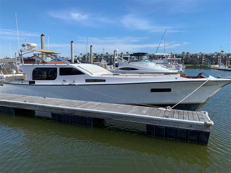 Little yacht sales. True North 39 Outboard Express LOA - 44' Length of Hull – 38’8″ Waterline – 38’6″ Beam – 13’6″ Draft Engines Up – 2′ Draft Engines Down – 3′ Displacement – Approx. 20,000 lbs Standard Power – 700 HP Gasoline Fuel Capacity – … 