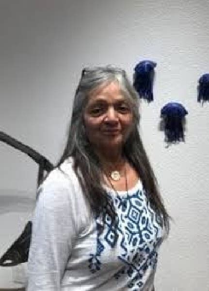 Botello began creating aquatic art after she started fishing with her husband. After facing various life struggles, she said creating art is therapeutic. Litzi Botello stands next to one of two art pieces; Jellyfish. …. 