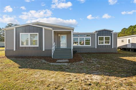 Live oak homes. The Raven H-2483N-PS is a Manufactured prefab home in the Painted Sheetrock series built by Live Oak Homes. This floor plan is a 2 section Ranch style home with 3 beds, 2 baths, and 1260 square feet of living space. Take a 3D Home Tour, check out photos, and get a price quote on this floor plan today! 