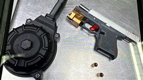 Livermore police seize handgun with large capacity drum magazine, arrest 2 for robbery