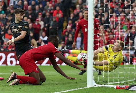 Liverpool blows title race open after thrilling Arsenal draw