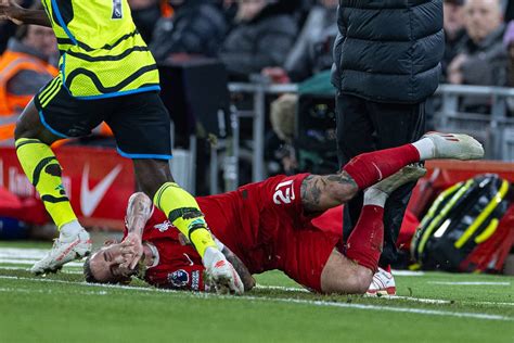 Liverpool defender Tsimikas injured after colliding with Klopp in game against Arsenal
