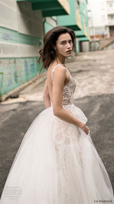 Liz martinez bridal. Spring Bridal Trends 2024: Liz Martinez. The Liz Martinez Spring/Summer 2024 Collection, “La Dimora,” was made for the bride who loves the sheer gown trend! We’re obsessed with the beautiful Swarovski-studded lattice pattern of sheer ribbons on the Dahlia gown. Find your favourite below! 