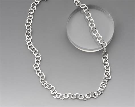 * Pendant measures 23mm x 19mm* Chain is adjustable from 1