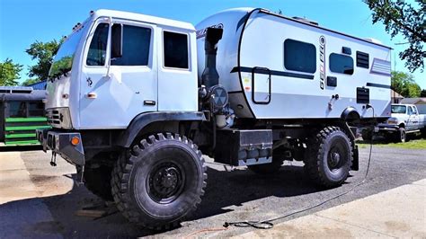 Get the 1998 Stewart & Stevenson LMTV M1079 4X4 Camper Truck at Midwest Military Equipment. Turn-key ready with low mileage, reliable engine, and various features. Call now for shipping and customization options!. 