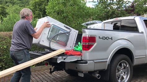 Loading washer and dryer on pickup truck without help - YouTube