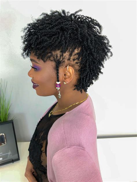 14 Mohawk Hairstyles for Black Women. Scroll through this gallery for easy, edgy, and versatile mohawk hairstyles for Black women: 1. The Big 'Fro The bigger, the better. Style your big afro into a fun mohawk style by way of a frohawk. Pin sides up to create the look in an instant. 2. The Everyday Mohawk Wear this to the office and more.