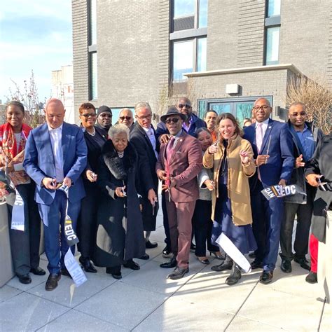 Local officials celebrate the opening of Jay Square