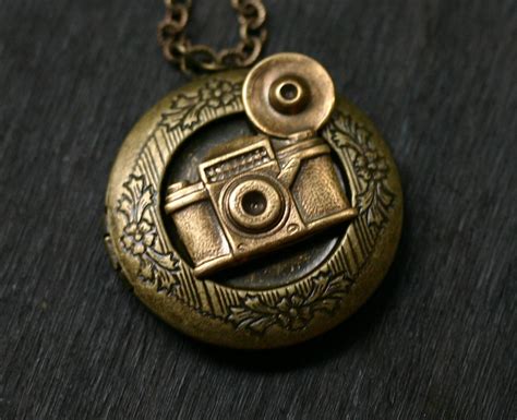 Locket camera. Old camera necklace, Old camera locket, Vintage locket, Camera photo necklace, Camera photo locket, Old camera pendant, Photographers gift (79) $ 44.21. FREE shipping Add to Favorites Camera Floating Charm for Floating Lockets-7mmx8mm-1 Piece-Gift Idea for Women (15.3k) $ 2.00. Add to Favorites ... 
