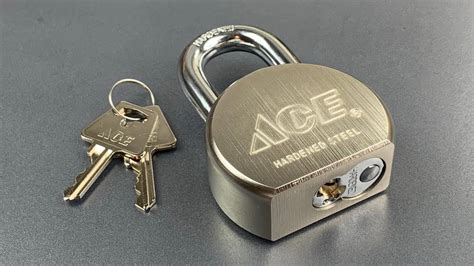 A PACLOCK 90A would probably fit the bill. Or an a American 1100 for a little less $. Any lock that will fit on a locker is going to be easy to cut with bolt cutters, but either of those is not likely to be picked or bypassed quickly and discretely.
